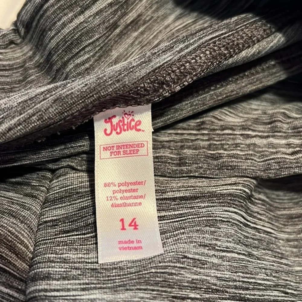 Justice leggings size kids 14. These are solid and will last a long time!!